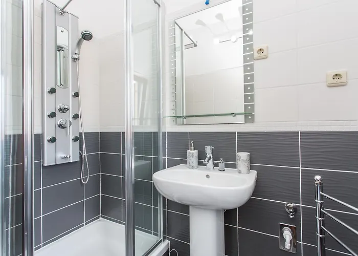 Tb *